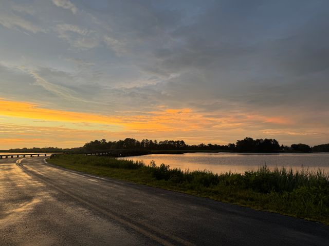 sunset%20over%20a%20lakeside%20road sunset%20over%20a%20lakeside%20road